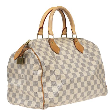 louis vuitton small duffle bag.